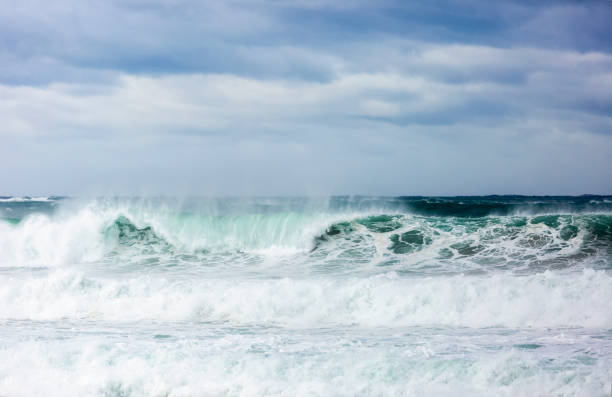 istock Big ocean waves in wind, beautiful nature background with copy space 1336378562