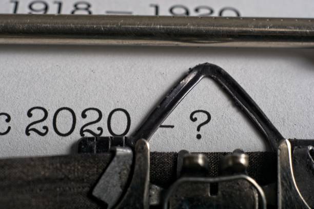 istock Pandemic 2020 concept  with dates ‘1918-1920’ & ‘2020-?’ typed  on mechanical typewriter 1336383198