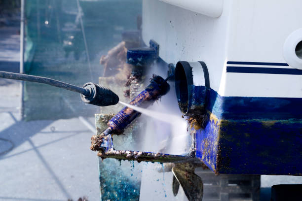 istock blue boat hull cleaning pressure washer barnacles 1336384542