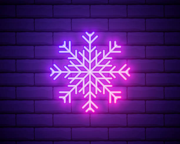 istock Snowflake neon sign. Luminous signboard with winter decoration. Night bright advertisement. Vector illustration in neon style for Christmas, New Year card isoalated on brick wall 1336386394