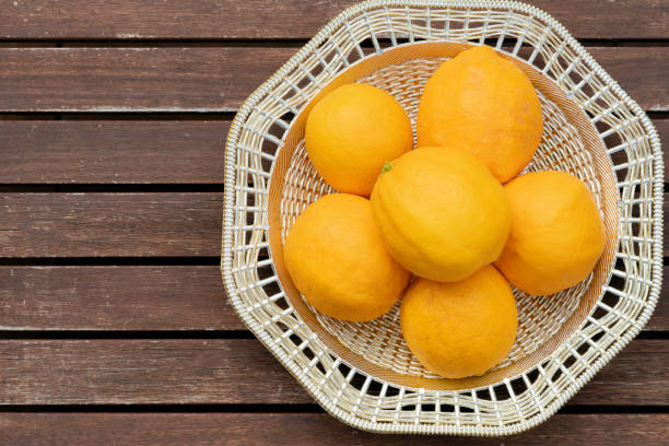 istock Bowl of six ripe lemons  from overhead 1336388067