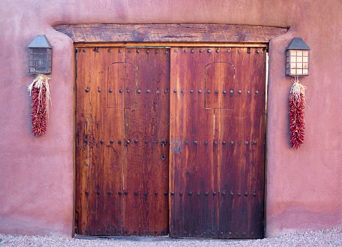 Santa Fe Style: Adobe Wall, Antique Wood Door, Ristras