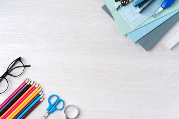 istock Back to school design concept with stationery over wooden table background. 1336408708