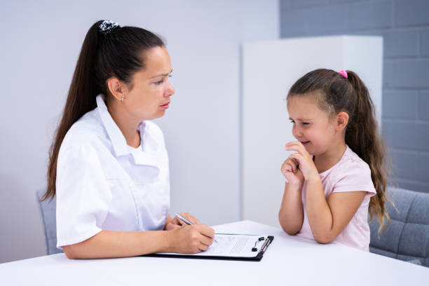istock Sick Child Therapy. Therapist Comforting Kid 1336413777