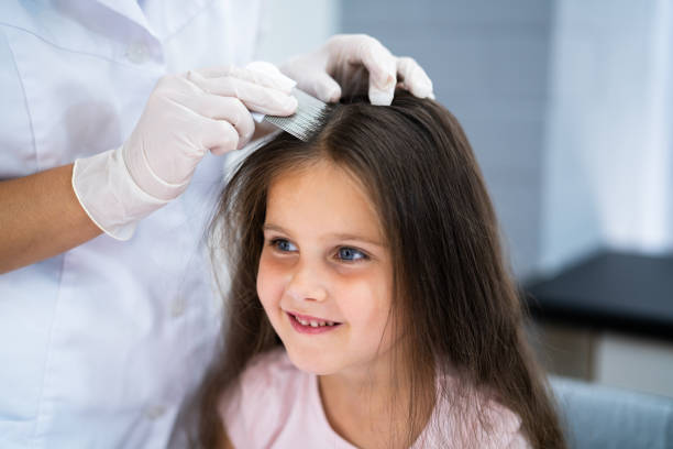 istock Child Doctor Checking Head Hair 1336413781