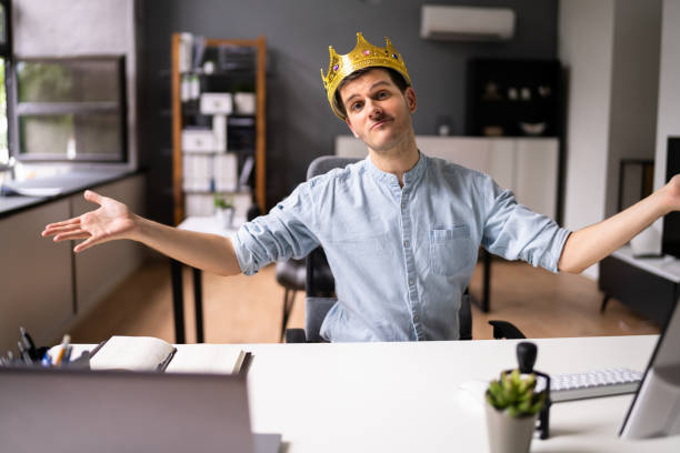 istock Manager Boss Man Wearing King Crown 1336414427