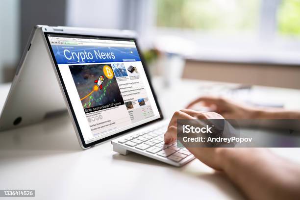Reading Online Crypto Market Newspaper Stock Photo - Download Image Now - Non-Fungible Token, Cryptocurrency, Altcoin