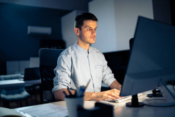 istock Business Analyst Businessman Working Late On Computer 1336414600