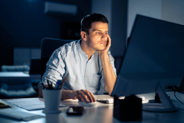 istock Business Analyst Businessman Working Late On Computer 1336414610