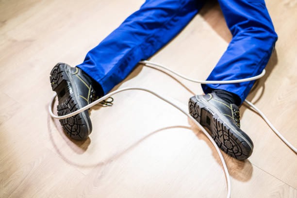 istock Electrician Man Cable Trip Injury 1336414654