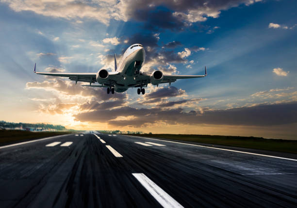Passenger airplane taking of at sunrise