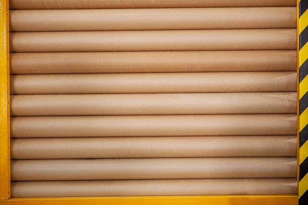 istock Stack of piled carboard carton tubes 1336419206
