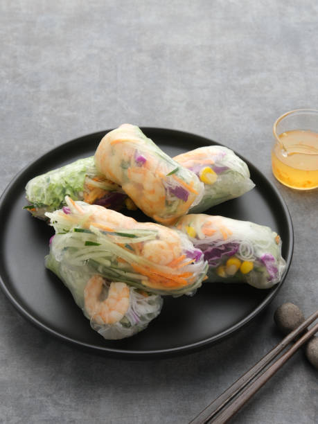 istock Vegetable spring roll, fresh roll salad made from mix vegetables and shrimp. 1336420368