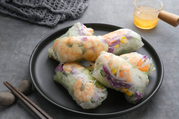 istock Vegetable spring roll, fresh roll salad made from mix vegetables and shrimp. 1336420373