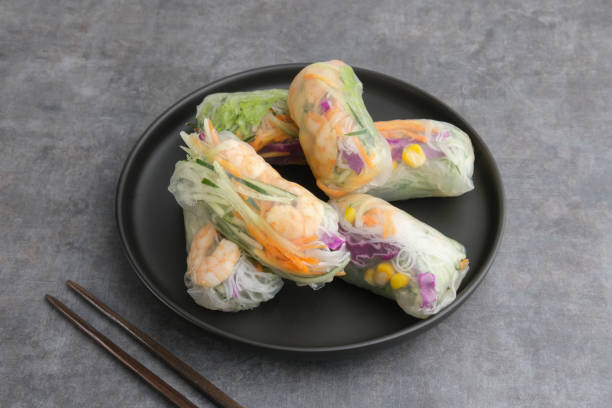 istock Vegetable spring roll, fresh roll salad made from mix vegetables and shrimp. 1336420379