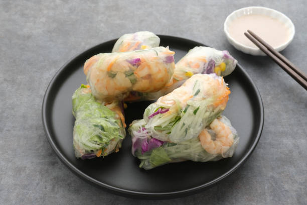istock Vegetable spring roll, fresh roll salad made from mix vegetables and shrimp. 1336420383