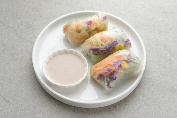 istock Vegetable spring roll, fresh roll salad made from mix vegetables and shrimp. 1336420396
