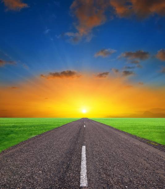 istock asphalt road at the sunset 1336426390