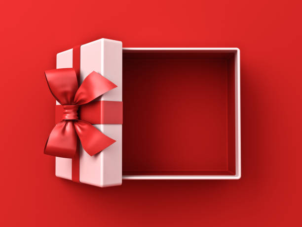 istock Blank white gift box open or top view of present box tied with red ribbon and bow isolated on red background with shadow minimal conceptual 1336428332