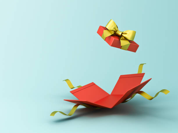 istock Surprise open red gift box or red present box with gold ribbons and bow isolated on light blue green pastel color background with shadow 1336428334