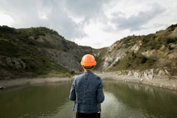 istock Female engineer watching on the lake 1336429336