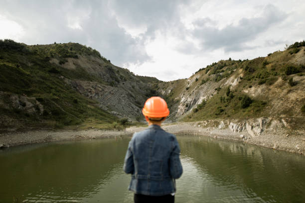 istock Female engineer watching on the lake 1336429377