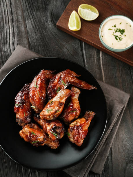 roasted chicken wings with spices in plate. - chicken barbecue chicken barbecue grilled chicken imagens e fotografias de stock