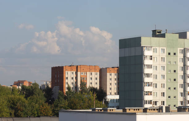 istock Tree russian nine floors houses in row 1336437052