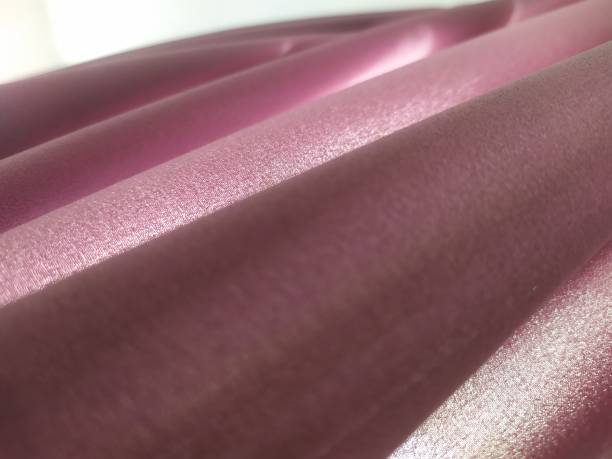 istock soft and beautiful purple curtain folds 1336438480