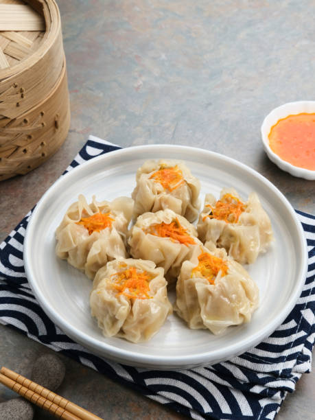 istock Delicious Dim Sum, home made chinese dumplings served on plate. 1336438833
