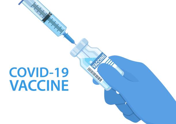 istock Covid-19 coronavirus vaccine bottle and syringe injection in doctor hands. 1336442328