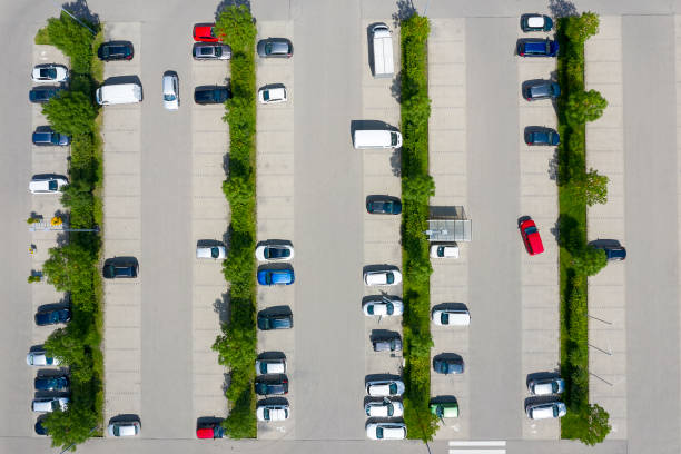 Aerial view of parking lot with cars stock photo