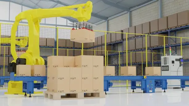 Factory 4.0 concept: The palletizing robot is arranging cartons to pallet in smart warehouse.