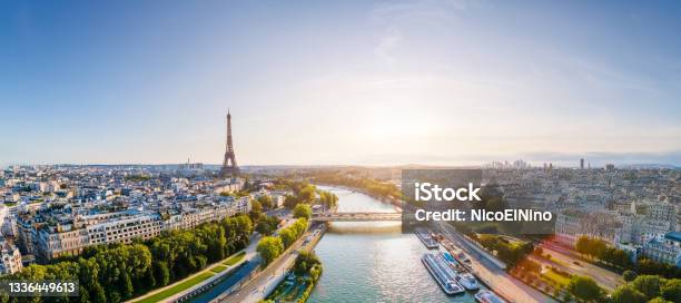Paris Aerial Panorama With River Seine And Eiffel Tower France Romantic Summer Holidays Vacation Destination Panoramic View Above Historical Parisian Buildings And Landmarks With Blue Sky And Sun Stock Photo - Download Image Now