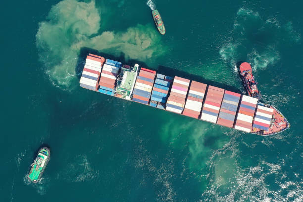 istock Aerial top view container ship full load container for logistics import export, shipping or transportation concept background. 1336450895