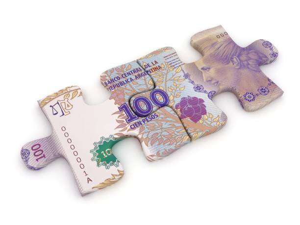istock Argentina peso money puzzle 1336451814