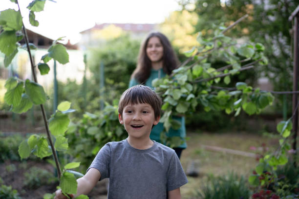 istock A small boy is happy to work in garden 1336452456