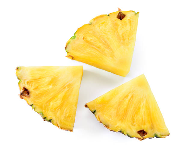 istock Pineapple slices isolate. Cut pineapples on white. Fresh pineapple set top viw. 1336453320