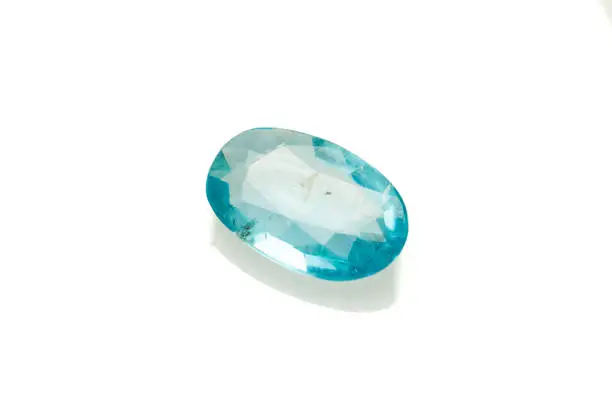 Natural blue apatite on the white background