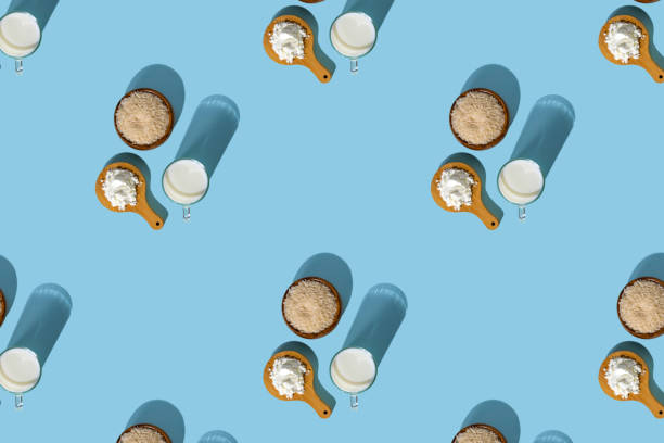 istock Powdered vegan milk. Rice milk. Pattern. Blue background 1336457536