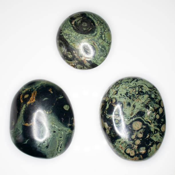 istock Natural polished jasper kabamba on the white background 1336458015