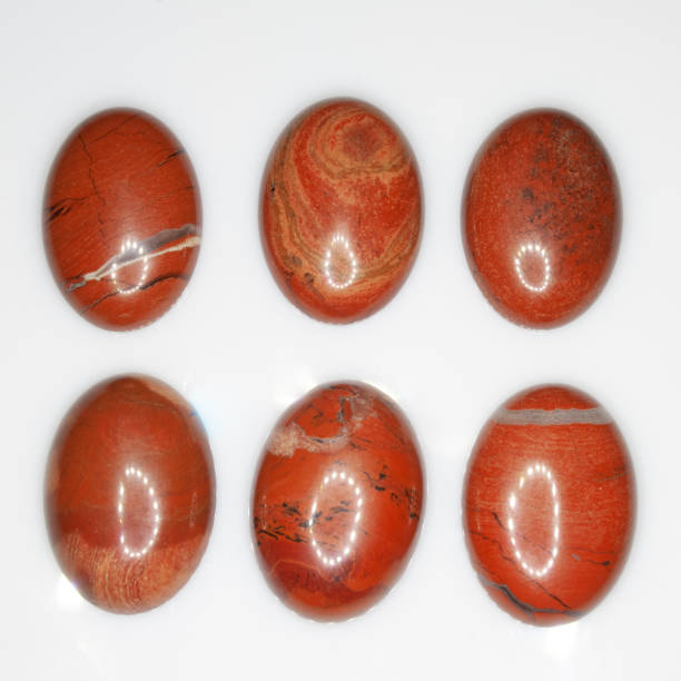 istock Natural red polished jasper on the white background 1336458047