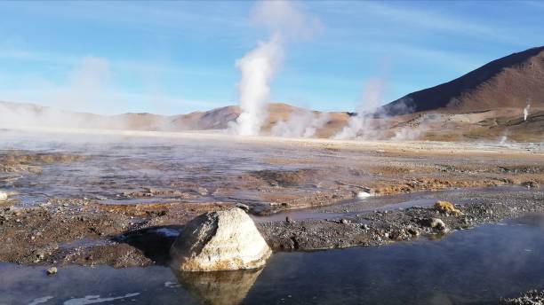 Fumaroles and geysers of El Tatio Fumaroles and geysers of El Tatio, a geyser field located in the Andes Mountains of northern Chile, at sunrise. hot spring photos stock pictures, royalty-free photos & images