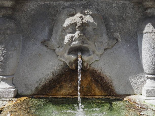 istock ancient fountain water jet 1336460997