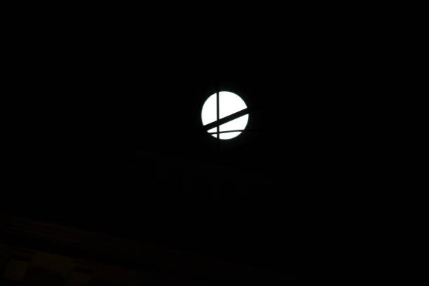 istock moonlight through city antennas 1336463466