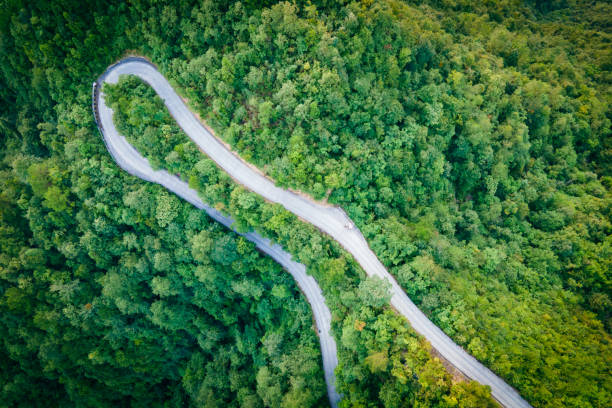 istock Aerial view mountain curve road 1336464790