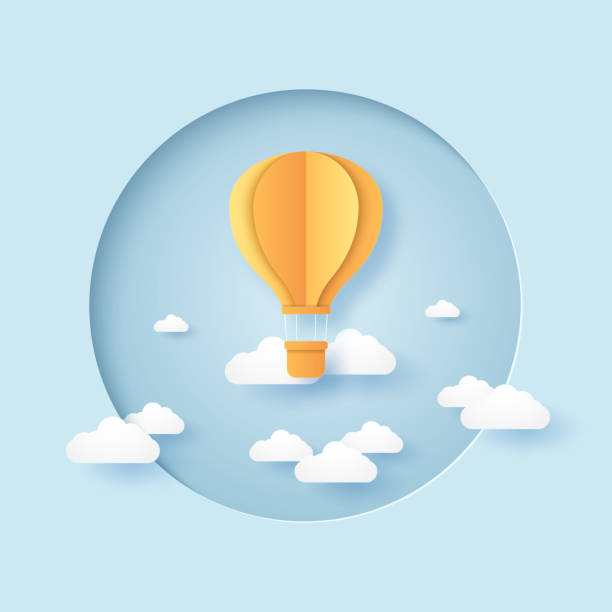 istock bright folded hot air balloon flying in the blue sky in circular frame, paper art style 1336465169
