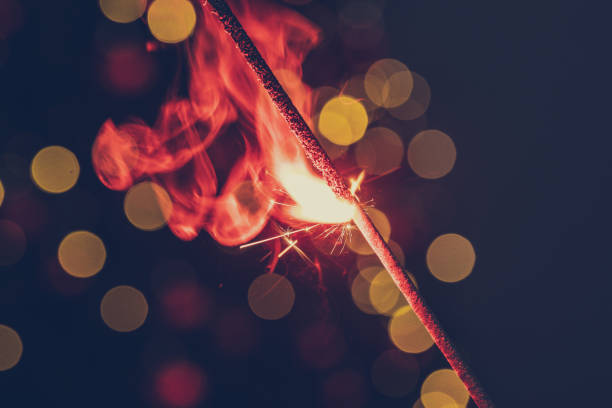istock Red bengal sparkle lights close up on dark background 1336465291