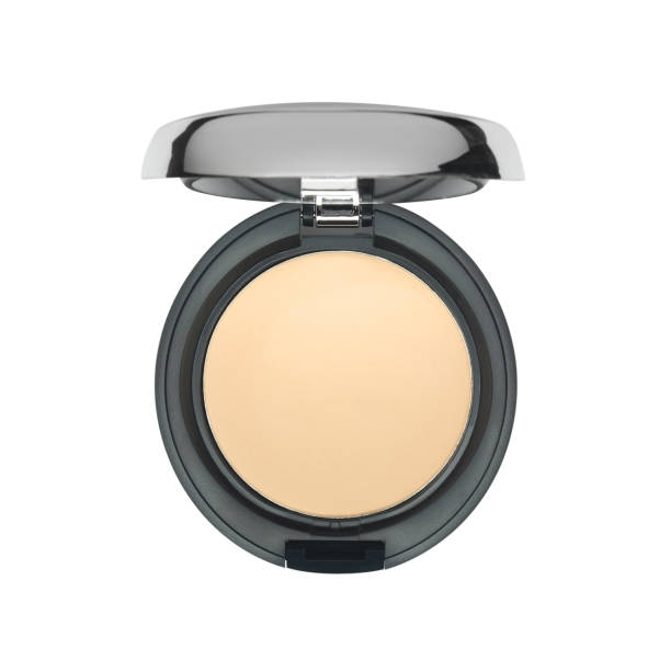 istock Dry face powder in round black casket isolated on white 1336467597