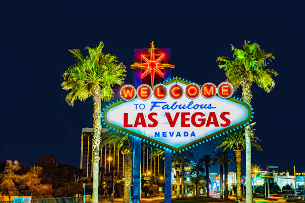 famous Las Vegas sign at city entrance, detail by night Las Vegas, USA - March 11, 2019: famous Las Vegas sign at city entrance, detail by night. las vegas stock pictures, royalty-free photos & images